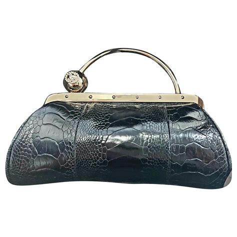 Pochette Gucci in Coccodrillo Nero 